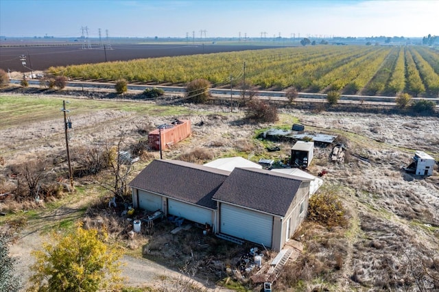 birds eye view of property featuring a rural view