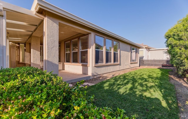 exterior space with a yard