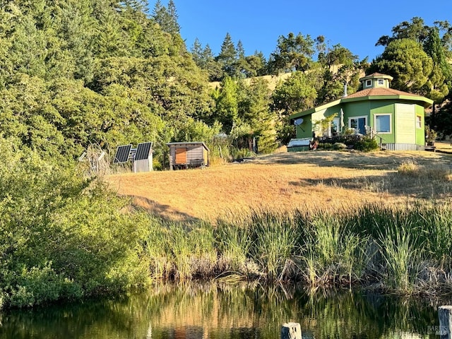 view of yard with a water view