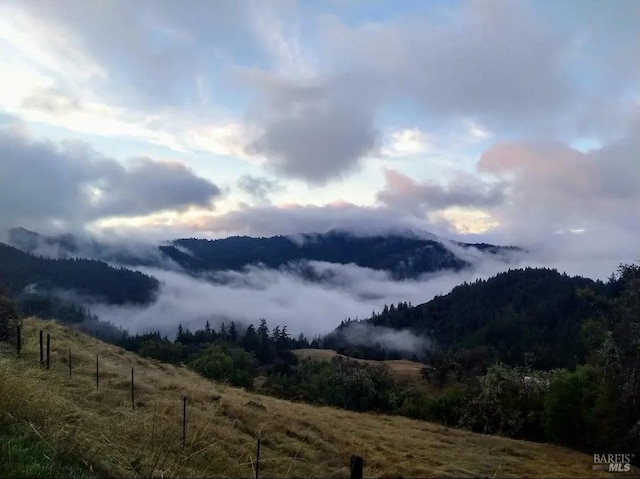 view of mountain feature featuring a rural view