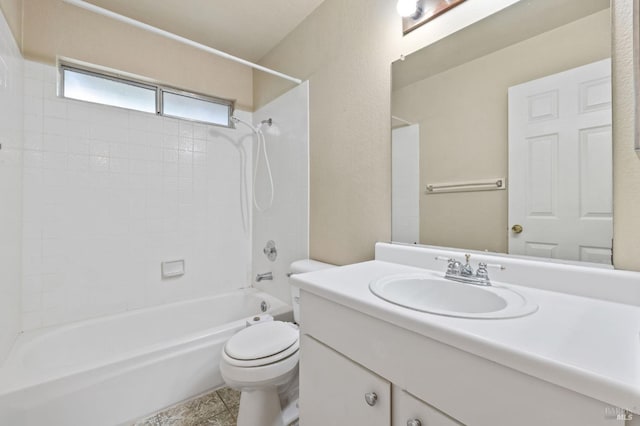 full bathroom featuring vanity, shower / washtub combination, toilet, and tile patterned floors