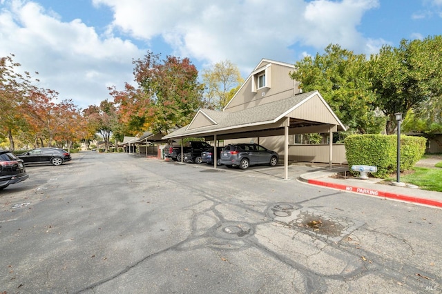 view of car parking with a carport