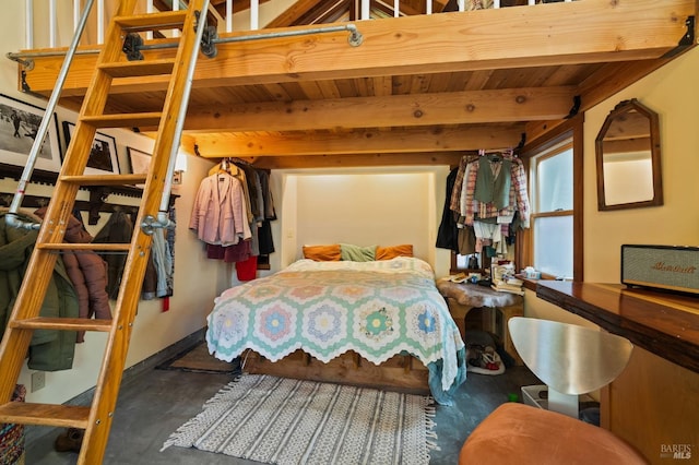 bedroom featuring beamed ceiling