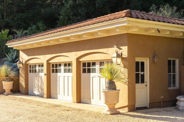 view of outbuilding featuring a garage