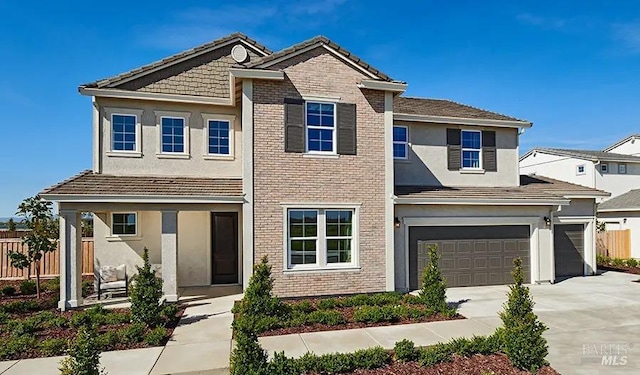 view of front of property with a garage