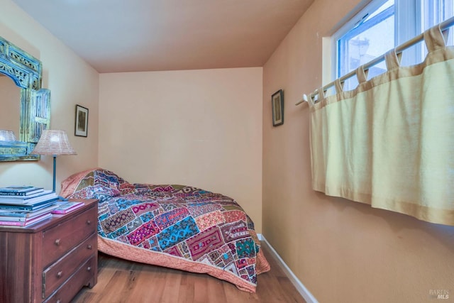 bedroom featuring hardwood / wood-style flooring