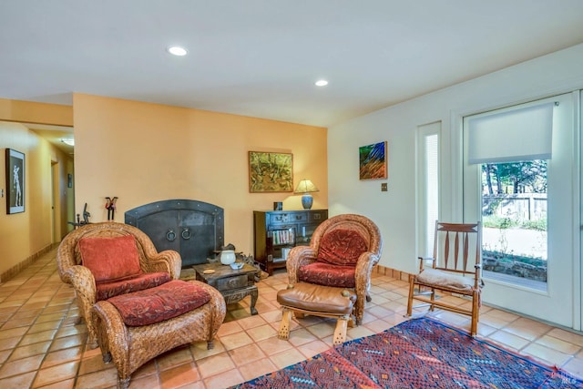 living area featuring light tile patterned flooring