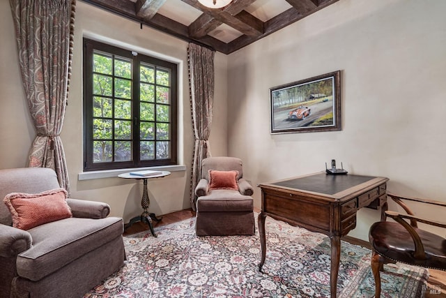 office area featuring light hardwood / wood-style flooring, beamed ceiling, and coffered ceiling