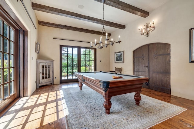 rec room featuring light hardwood / wood-style floors, beam ceiling, and pool table