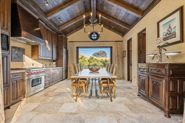 dining room with wood ceiling, beam ceiling, and high vaulted ceiling