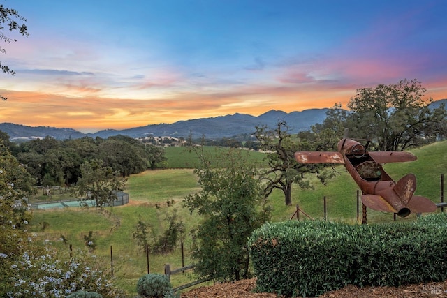 property view of mountains featuring a rural view