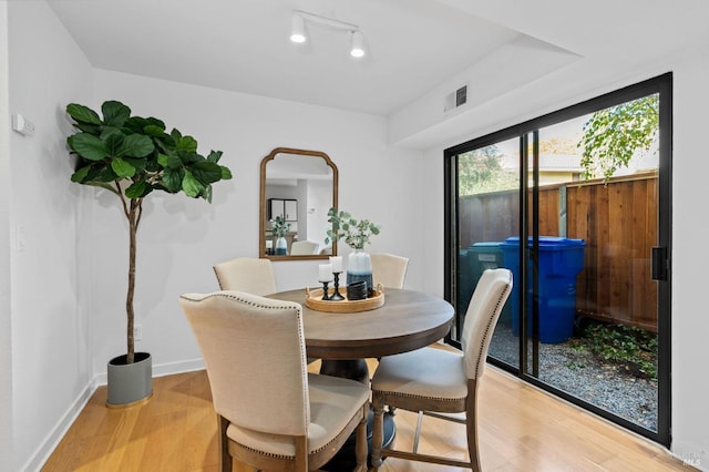 dining room featuring light hardwood / wood-style floors