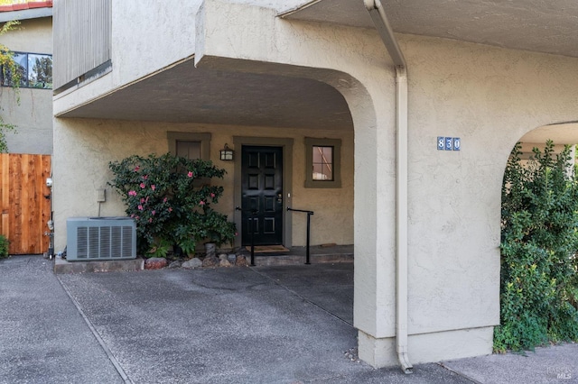 property entrance featuring central AC