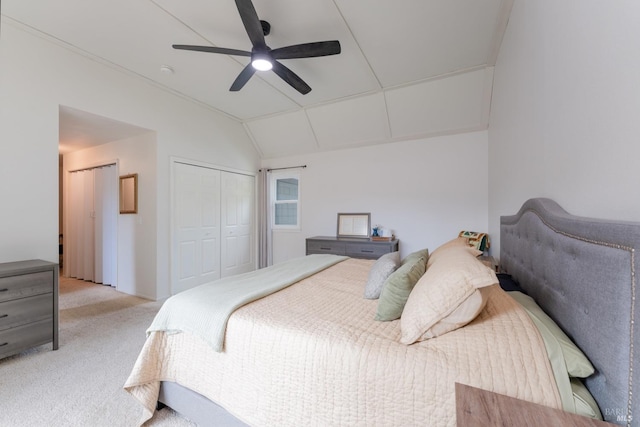 carpeted bedroom with lofted ceiling and ceiling fan