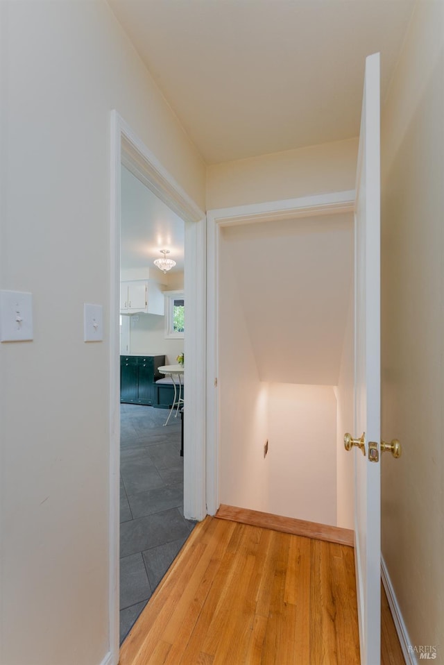 hallway featuring hardwood / wood-style flooring