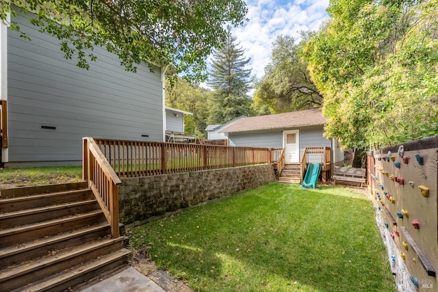 view of yard featuring a deck