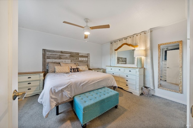 carpeted bedroom with ceiling fan and crown molding