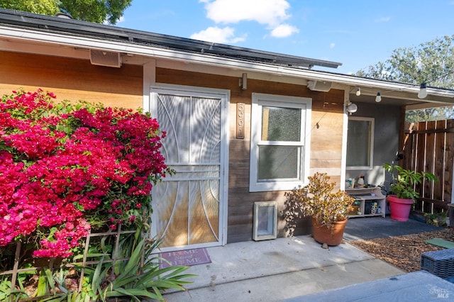 doorway to property with a patio