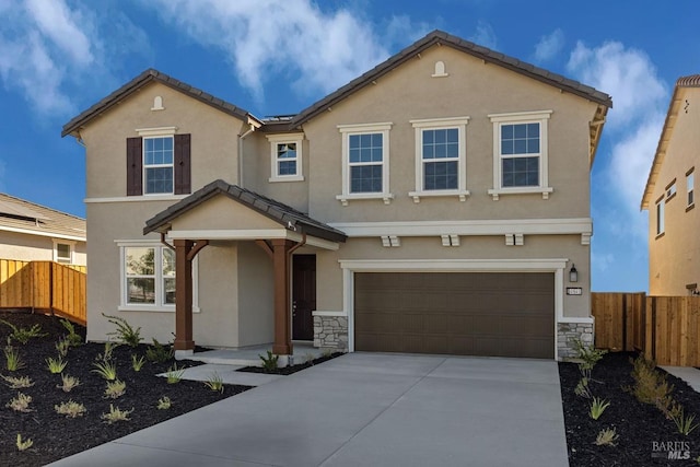 view of front of property with a garage