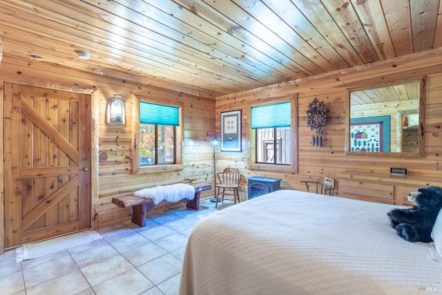 tiled bedroom featuring wooden walls and wooden ceiling