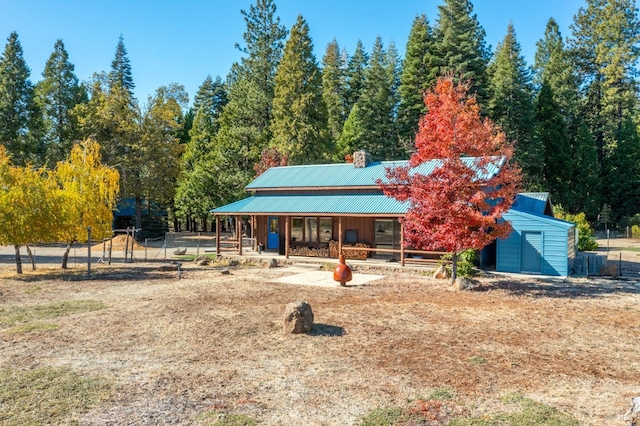 view of front facade with an outbuilding