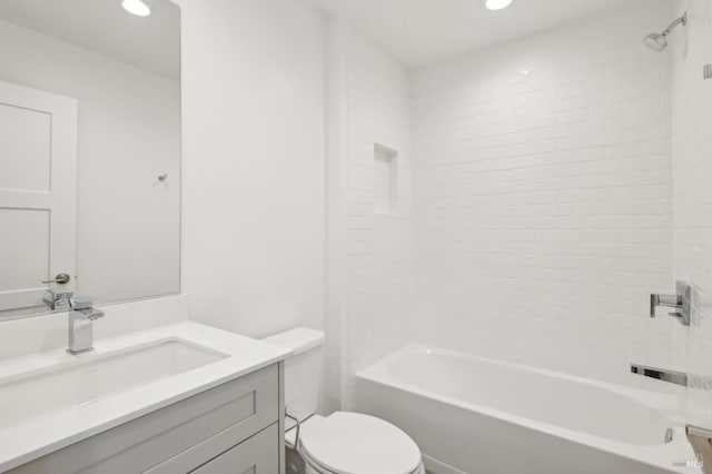 full bath featuring  shower combination, recessed lighting, vanity, and toilet