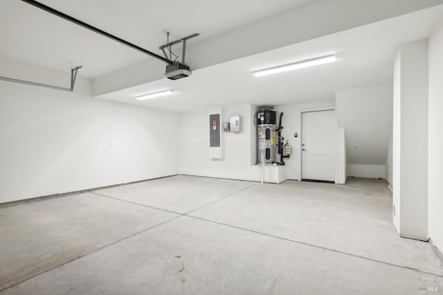 garage with water heater, a garage door opener, and electric panel