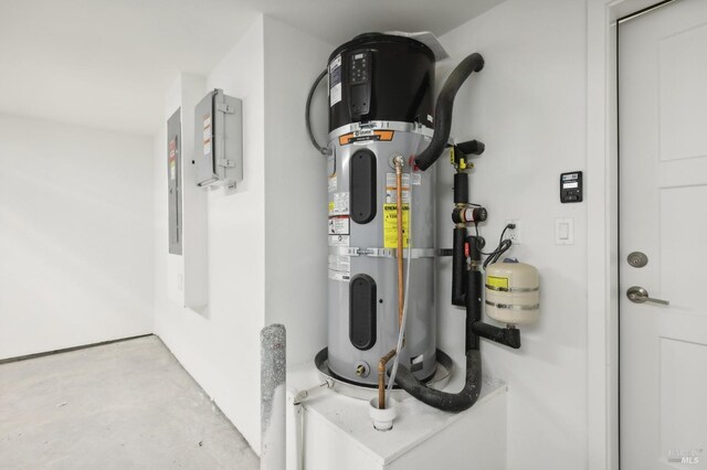 utility room with water heater