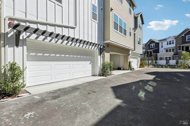 view of property exterior featuring a garage