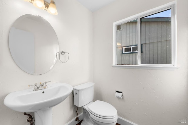 bathroom featuring toilet