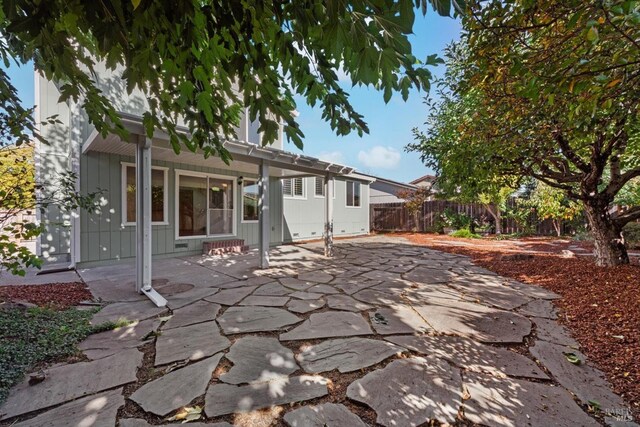 back of house featuring a patio area