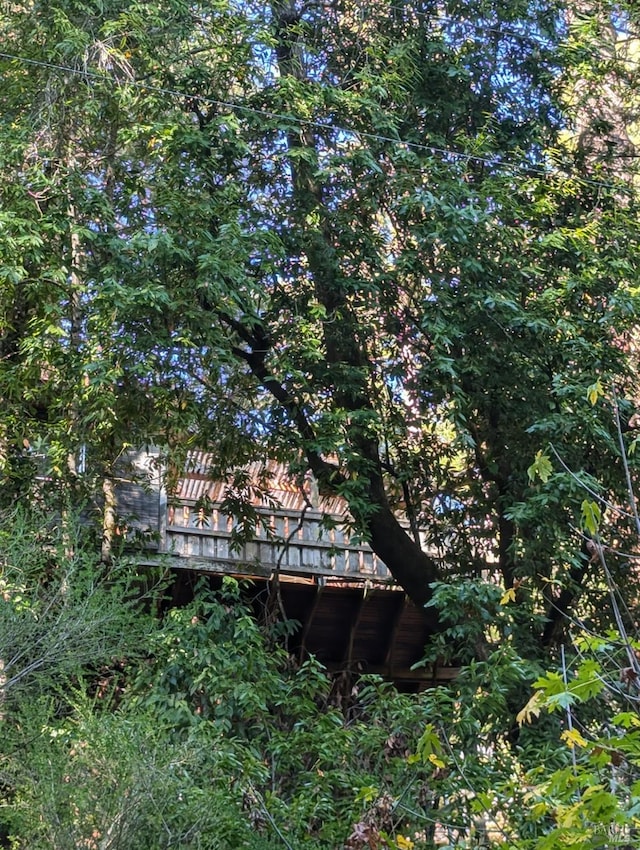 view of side of home featuring a deck