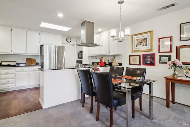 1240 Peppertree Cir, Saint Helena, CA 94574 - carpeted dining space with a chandelier and recessed lighting