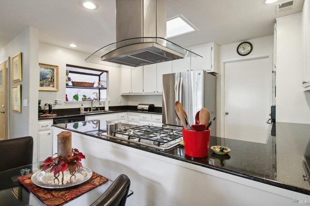 1240 Peppertree Cir, Saint Helena, CA 94574 - kitchen with appliances with stainless steel finishes, island range hood, a sink, white cabinets, and recessed lighting