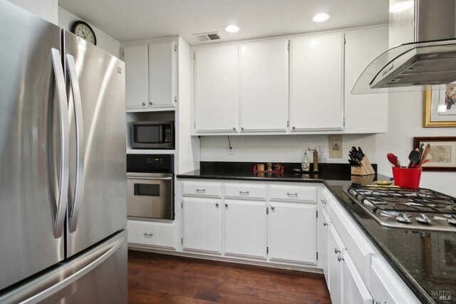 1240 Peppertree Cir, Saint Helena, CA 94574 - kitchen featuring stainless steel appliances, wall chimney range hood, dark wood-type flooring, white cabinets, and recessed lighting