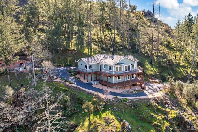 bird's eye view featuring a view of trees