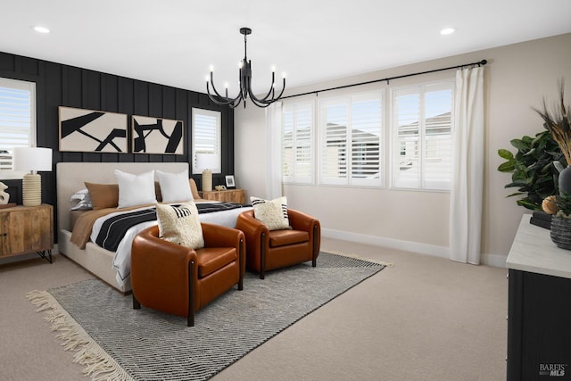 bedroom with light colored carpet, multiple windows, and a chandelier