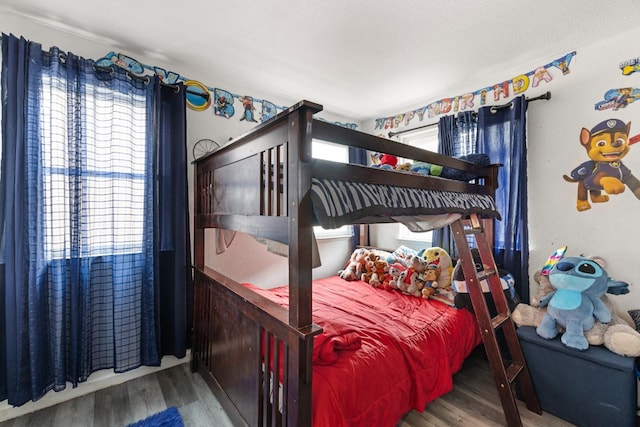 bedroom featuring hardwood / wood-style flooring