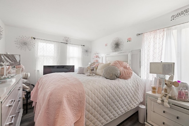 bedroom featuring dark hardwood / wood-style floors