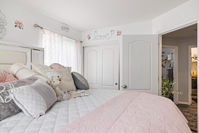 bedroom featuring hardwood / wood-style floors