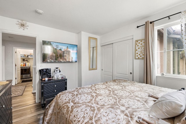 bedroom featuring a closet and hardwood / wood-style floors