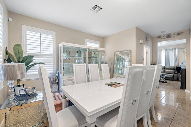 dining room with light tile patterned floors