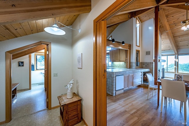 mudroom with wood ceiling and lofted ceiling