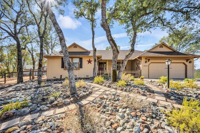 single story home with a garage