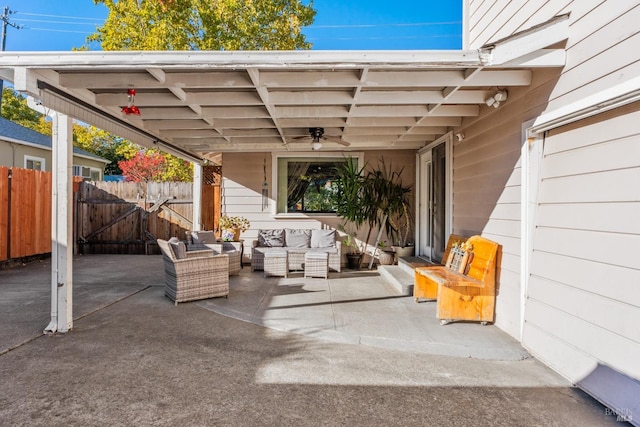 view of patio featuring an outdoor hangout area and ceiling fan