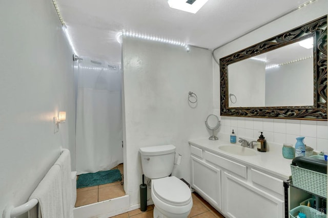 bathroom featuring curtained shower, tile patterned flooring, toilet, decorative backsplash, and vanity