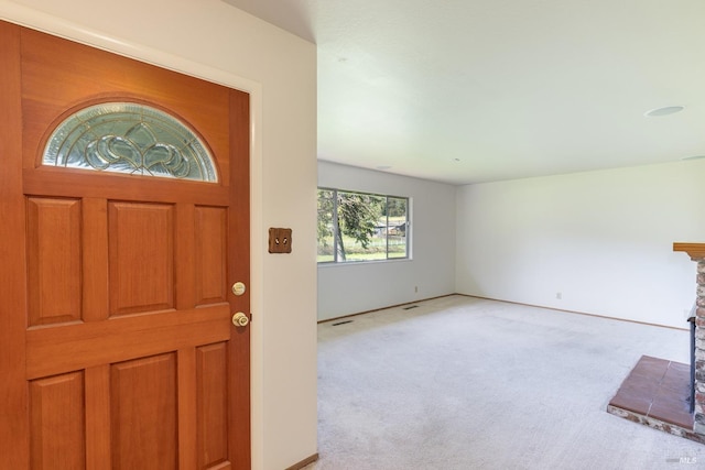 840 W Railroad Ave, Cotati, CA 94931 - foyer featuring a fireplace with raised hearth and light carpet