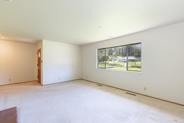 840 W Railroad Ave, Cotati, CA 94931 - unfurnished room featuring light colored carpet, visible vents, and baseboards