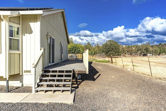 view of home's exterior featuring a deck