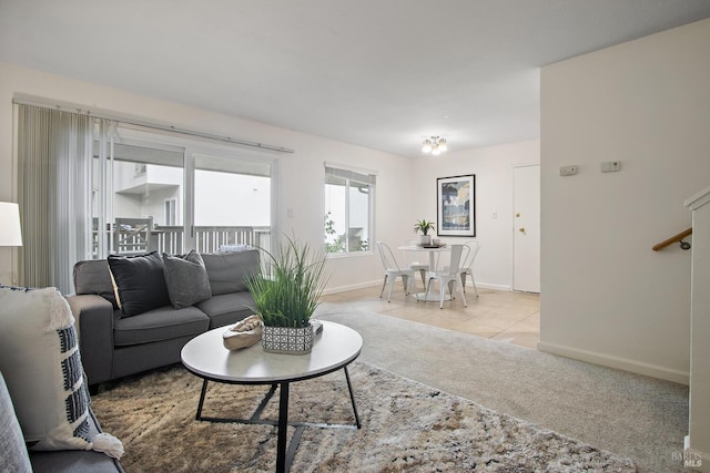 living room featuring light carpet